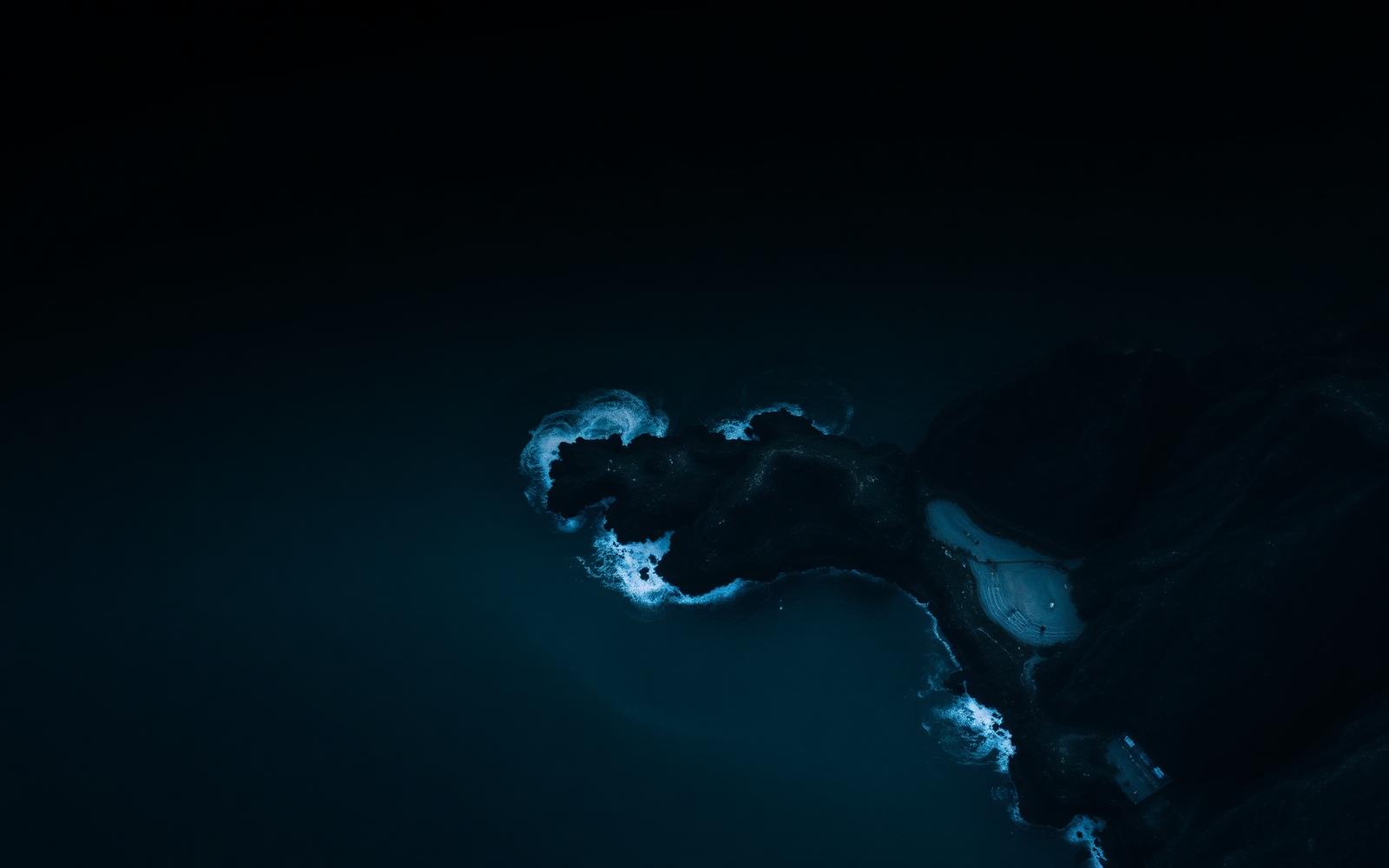 Aerial view of a coastline at dusk
